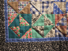 Load image into Gallery viewer, You can see the detail here of the hand quilting I did to emphasize the pattern of the blocks
