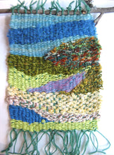 Load image into Gallery viewer, This is a sample from one weaving kit - simple shapes easily woven to suggest a landscape...you can have fun designing your own piece