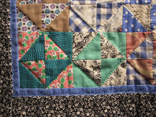 Load image into Gallery viewer, You can see the detail here of the hand quilting I did to emphasize the pattern of the blocks
